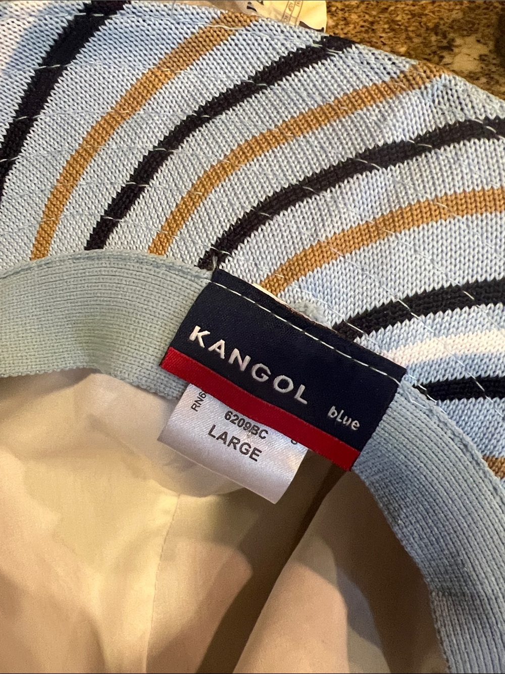 Kangol Light Blue Striped Knit Bucket Hat with Navy & Tan Accents